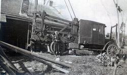 Mrs. Levi Dobson with Well-Drilling Equipment